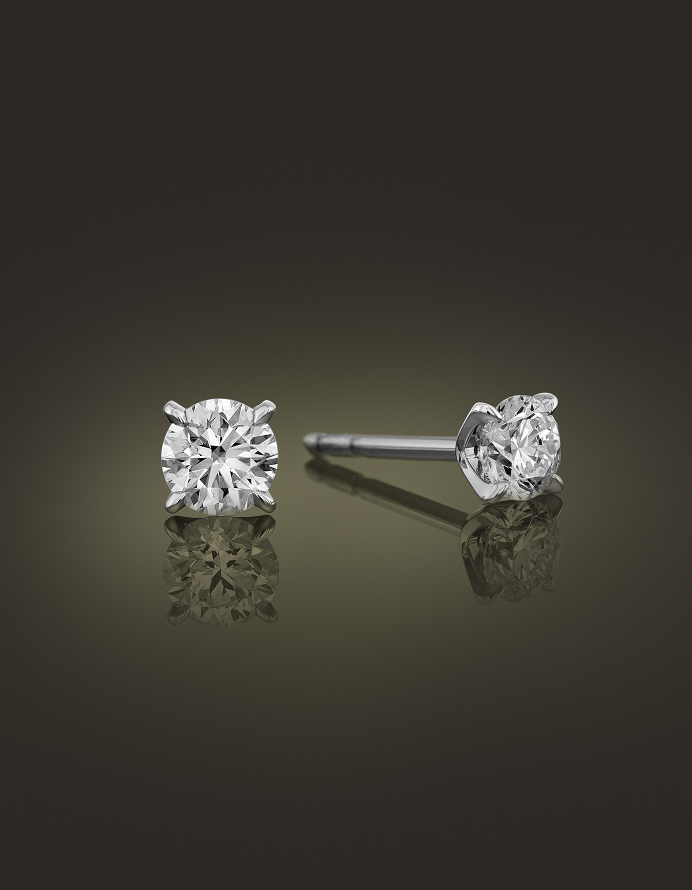 Guinnot Anonymous Solitaire diamond earrings in 18k white gold