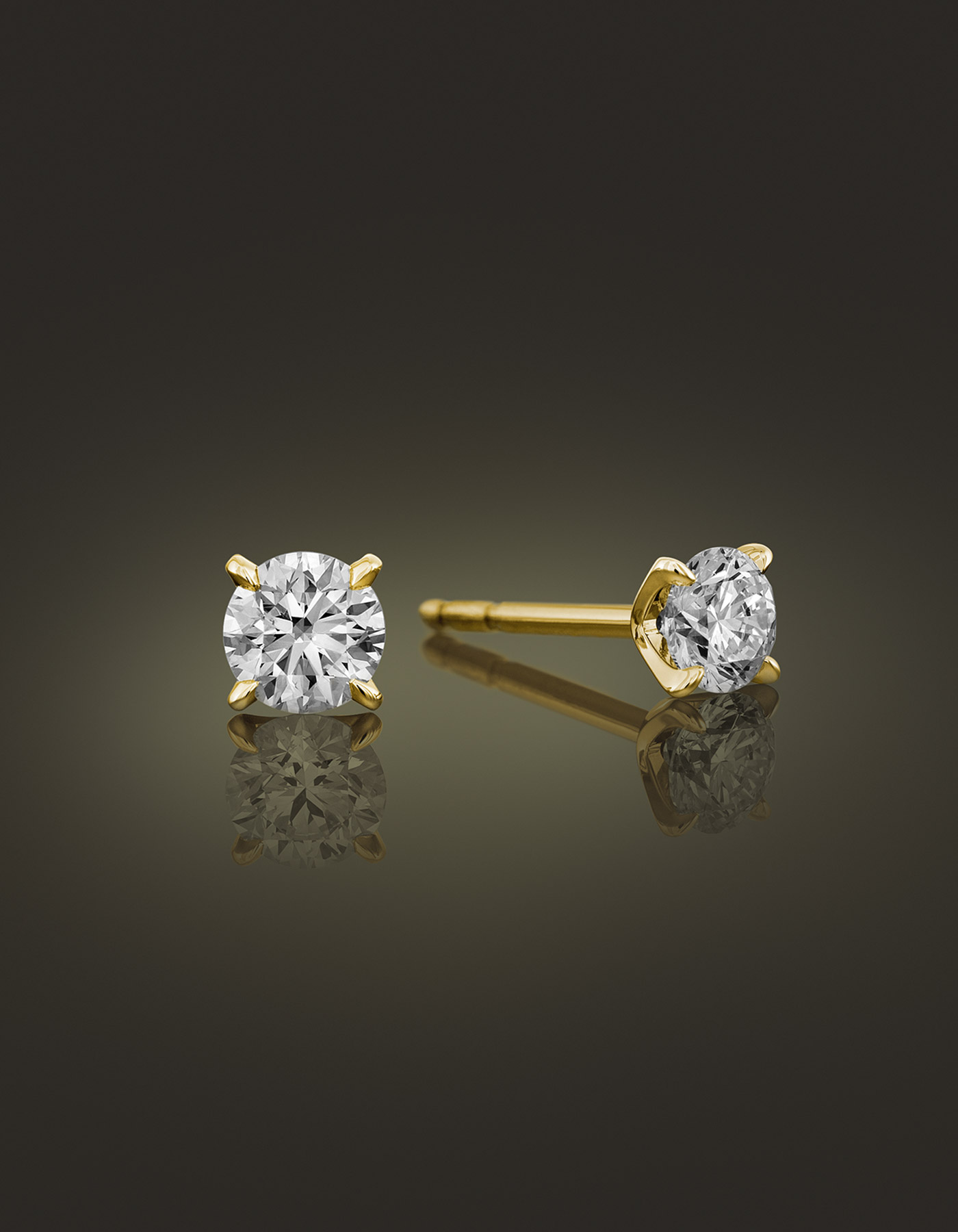 Guinnot Anonymous Solitaire diamond earrings in 18k yellow gold