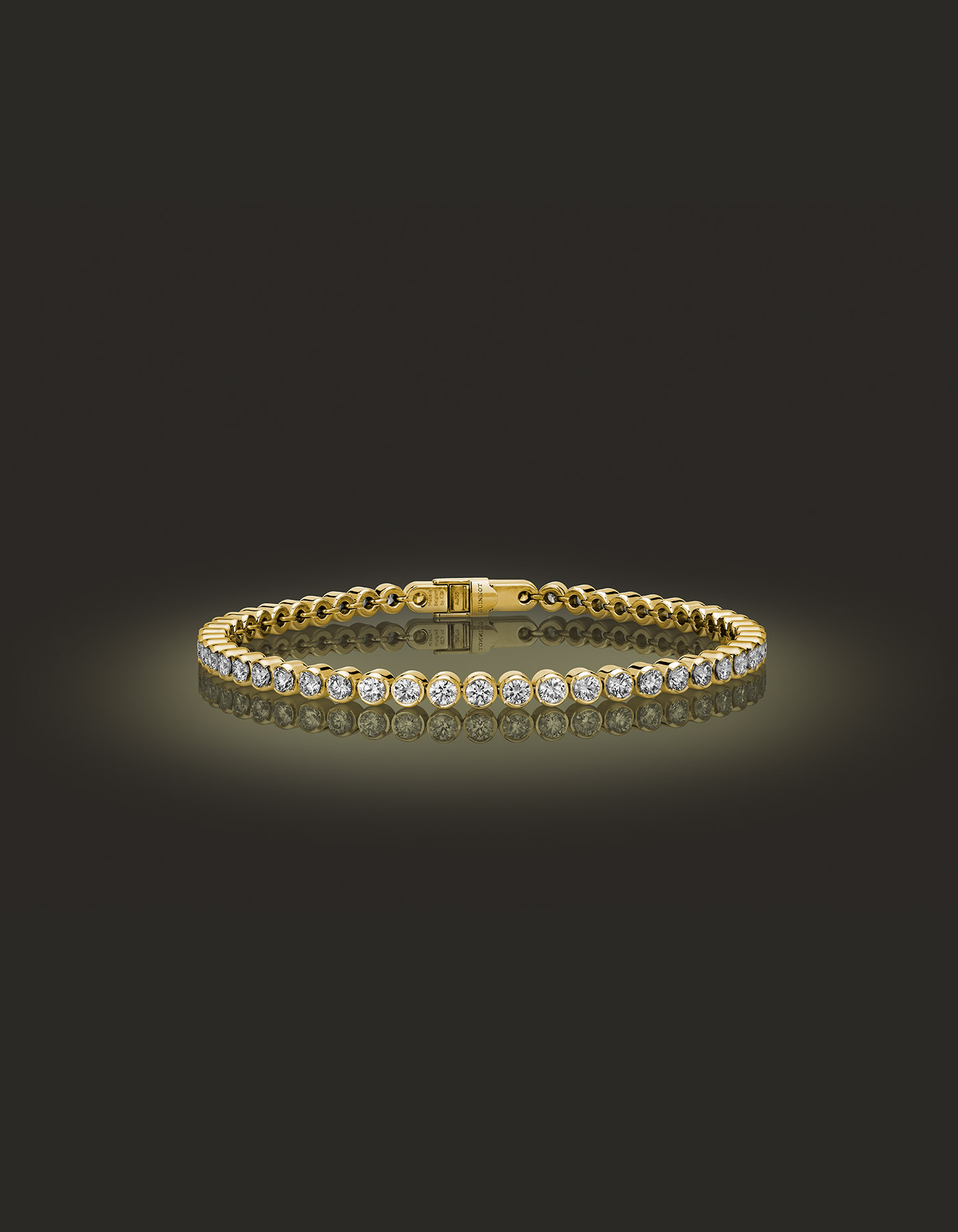 Guinnot Anonymous Bezel-set diamond tennis bracelet in 18k yellow gold